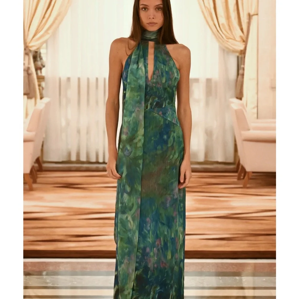 green emerald velvet dress Camille (also known as The Woman in a Green Dress) by Claude Oscar Monet